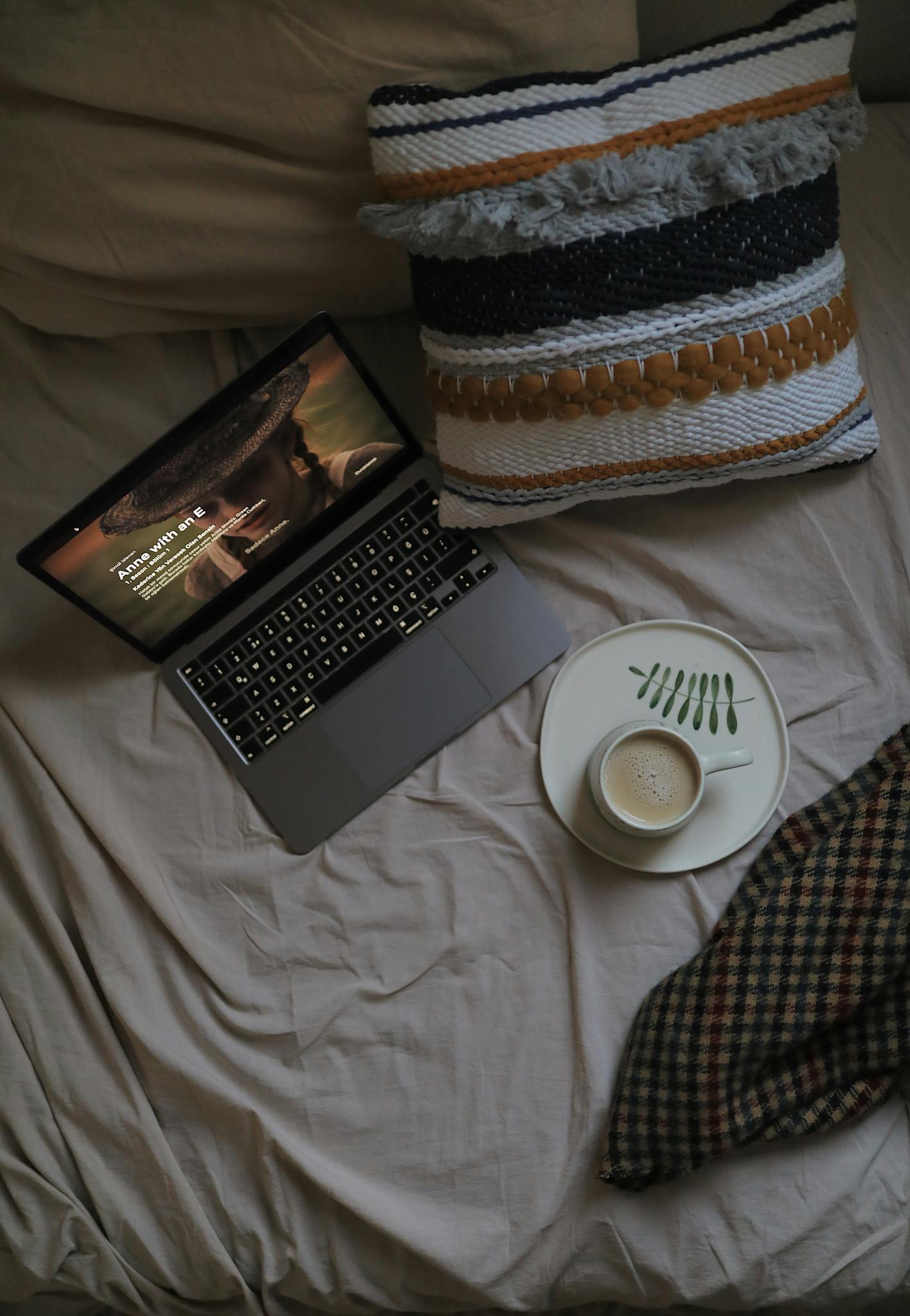 Overhead Photo of Bed with Laptop on Top